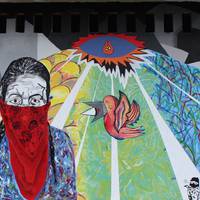 Aste Zapatista: Mural parte-hartzailea