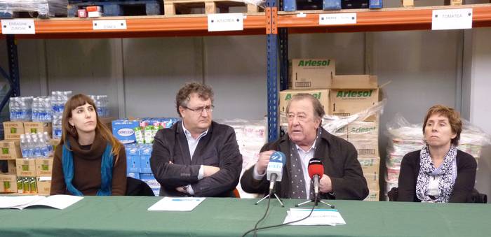 Janari gutxiago zabortegietara, eta gehiago premia duten familietara
